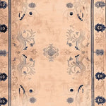 A beautifully designed Palace Garden Hand Knotted Area Rug, showcasing intricate floral patterns in rich blue and beige tones. This wool rug is perfect for adding elegance to a living room. Ideal as a large living room rug, it combines traditional craftsmanship with a modern aesthetic.