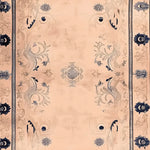 A beautifully designed Palace Garden Hand Knotted Area Rug, showcasing intricate floral patterns in rich blue and beige tones. This wool rug is perfect for adding elegance to a living room. Ideal as a large living room rug, it combines traditional craftsmanship with a modern aesthetic.