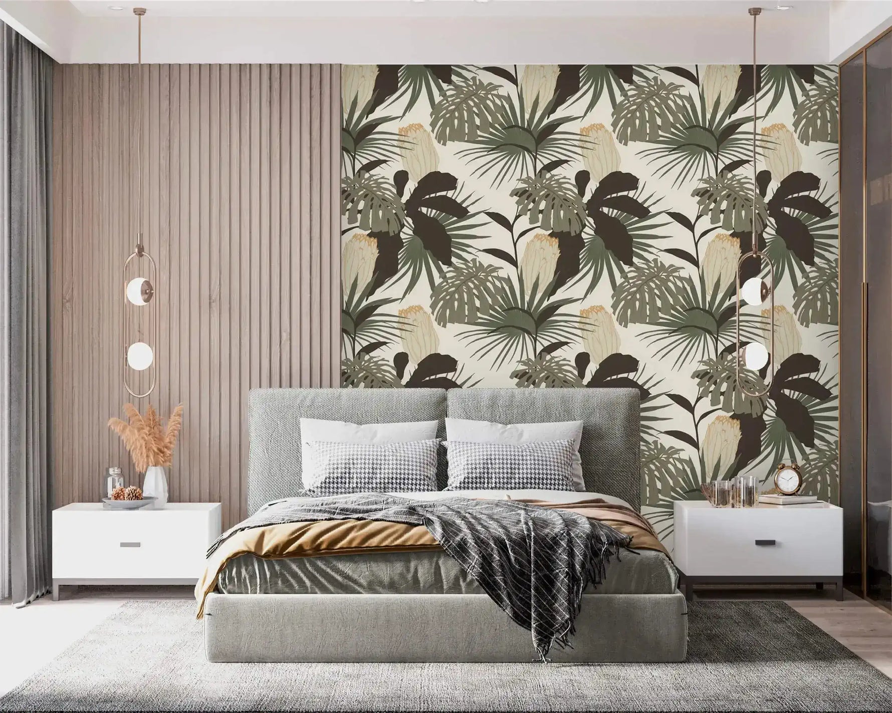 Vintage Glamour palm and monstera wallpaper as bedroom accent; sage and dark leaves on cream behind gray upholstered bed