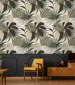 Vintage Glamour palm and monstera wallpaper above dark wainscoting; retro room with mustard armchair and wood sideboard