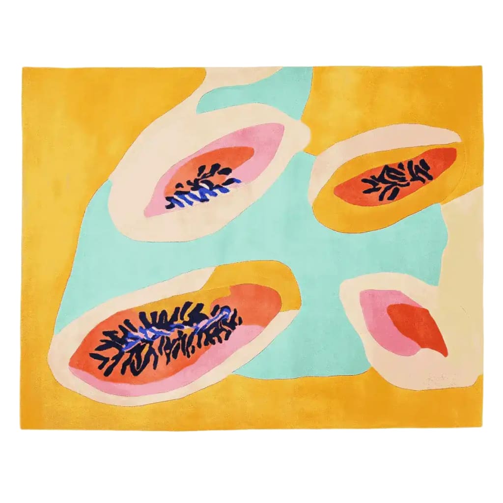 A vibrant hand-tufted area rug featuring abstract papaya designs in bold colors like orange, blue, and pink, set against a warm yellow and light blue background. This contemporary wool rug adds a splash of color to large living room spaces, perfect for those seeking stylish area rugs for living room decor.