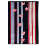 Contemporary Parallel Petals Hand Tufted Area Rug featuring colorful vertical stripes in red, blue, and cream, with abstract pink petal designs. Perfect wool rug for adding a modern touch to living rooms.