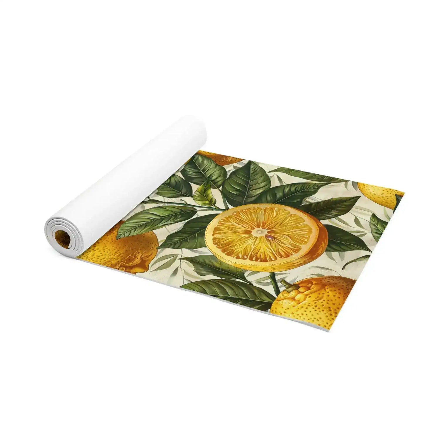Partially rolled yoga mat revealing its white underside and lemon-and-leaf printed top surface