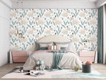 Pastel dino playground wallpaper with beige dinosaurs and green leaves on white in a soft pink child's bedroom
