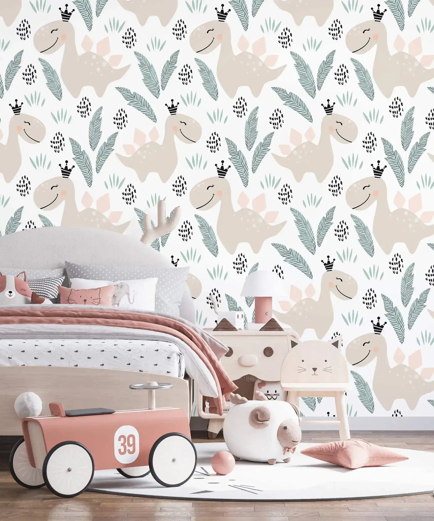Pastel dino playground wallpaper with smiling beige dinosaurs and green leaves on white in a child's nursery