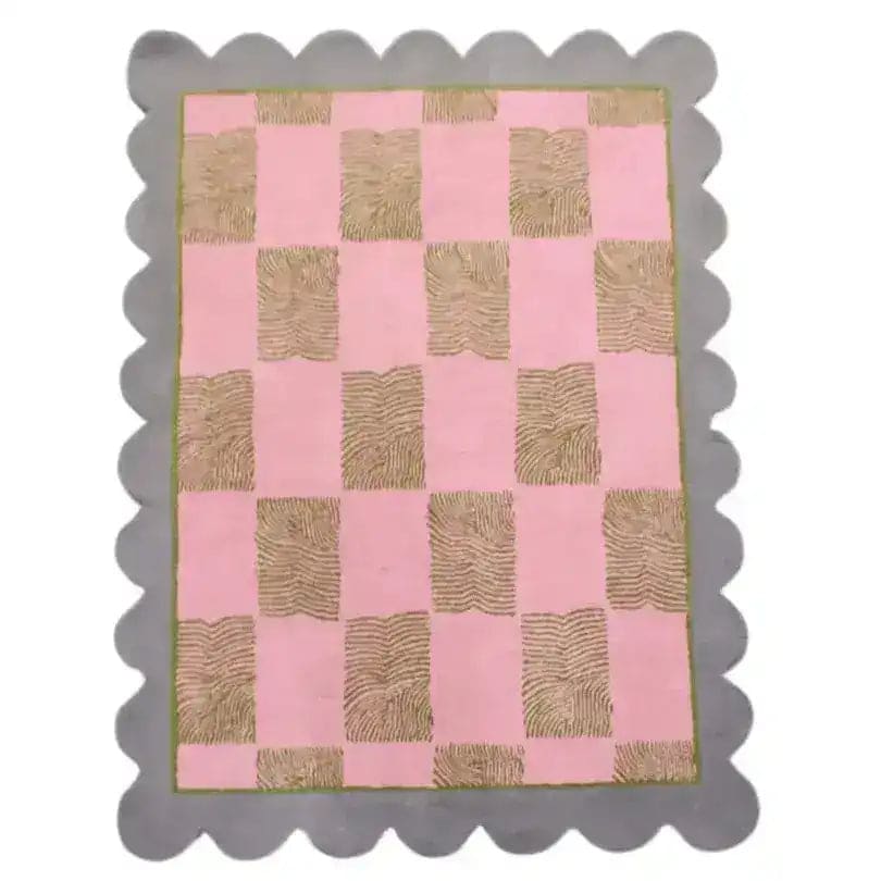 Top view of the Pastel Harmony Scalloped Leaf Hand Tufted Area Rug, showcasing a pink and beige checkered pattern with scalloped edges. Ideal for adding a contemporary touch to dining rooms or living rooms, this wool rug enhances formal dining aesthetics.