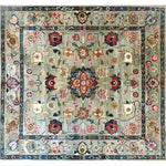 This elegant Pastel Medallion Blossom Hand Knotted Area Rug features a stunning vintage design with intricate floral patterns. Its Persian-inspired motifs and large size make it a perfect addition to any living room, adding a touch of classic charm and sophistication.