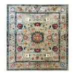 A beautifully crafted Pastel Medallion Blossom Hand Knotted Area Rug featuring a vintage floral design, perfect for large living rooms. The intricate patterns and rich colors evoke the elegance of Persian rugs, adding a touch of classic charm to any space.