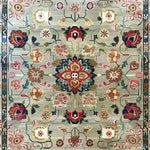 A beautifully designed Pastel Medallion Blossom Hand Knotted Area Rug showcasing a vintage floral pattern. This large living room rug features intricate Persian-inspired motifs with vibrant colors, perfect for adding an elegant touch to any space.