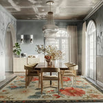 A beautifully styled living room featuring a large area rug with vibrant floral patterns in red and blue hues. The wool vintage rug adds elegance to the space, complementing the wooden dining table and chairs. Perfect for adding charm to any living room setting.