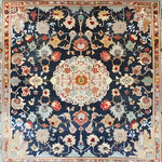 This exquisite hand-knotted area rug features a stunning floral design with vibrant colors set against a dark background. Perfect for enhancing the elegance of a living room or office, this square area rug combines vintage Persian rug aesthetics with modern wool craftsmanship.