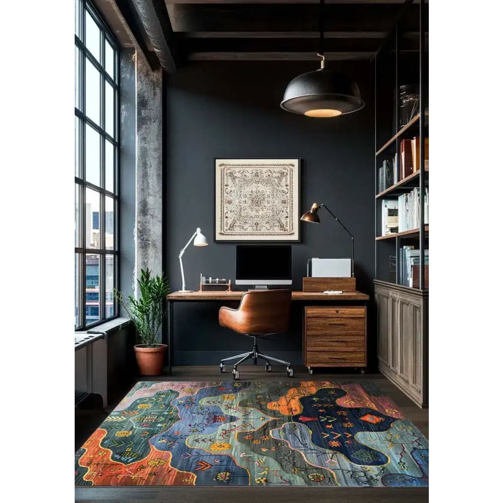 A contemporary area rug with a vibrant floral design, perfect for large living rooms. This 8x10 wool rug features a mix of bold colors and intricate patterns, enhancing the modern decor of a cozy home office setting.