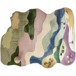 Vibrant and artistic area rug featuring an abstract design in pastel colors, ideal for wool rug enthusiasts. This hand-tufted wool rug showcases flowing shapes in green, pink, blue, and cream, perfect for adding a modern touch to rugs for living room or large living room rugs.
