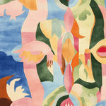 Vibrant and colorful close-up of the Patchwork Color Realm Hand Tufted Rug, showcasing an abstract design with bold patterns in shades of blue, pink, green, and orange. This contemporary wool square area rug adds a lively touch to living room spaces, making it a standout piece among living room area rugs and rugs for living room settings.