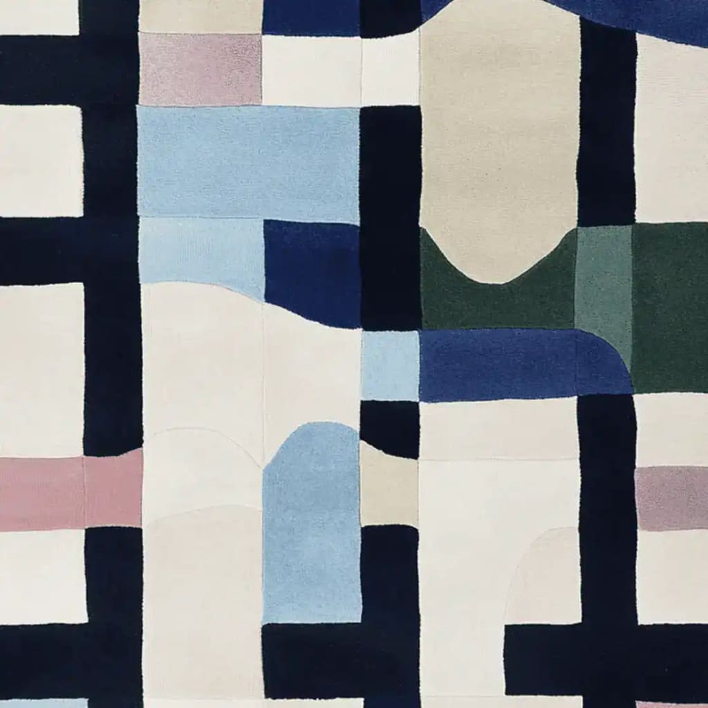 Discover the Pattern Panic Mode Hand Tufted Area Rug, a contemporary wool rug featuring an abstract geometric design with bold blocks of color. This large living room rug adds a modern touch to your space, perfect for anyone looking for stylish area rugs for the living room.