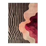 The Pattern Play Hand Tufted Rug is a stunning area rug featuring a contemporary design. It showcases bold black and beige stripes on one side, transitioning into abstract waves of pink, red, and burgundy on the other. This wool rug is perfect for adding a modern touch to bedroom spaces, serving as an elegant and stylish option for bedroom area rugs.