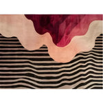 This striking area rug features a contemporary design with bold, abstract patterns in rich burgundy and coral tones, complemented by black and white stripes. Perfect for adding a modern touch to any bedroom, this hand-tufted wool rug is both stylish and functional, making it an excellent choice for those seeking unique bedroom area rugs.