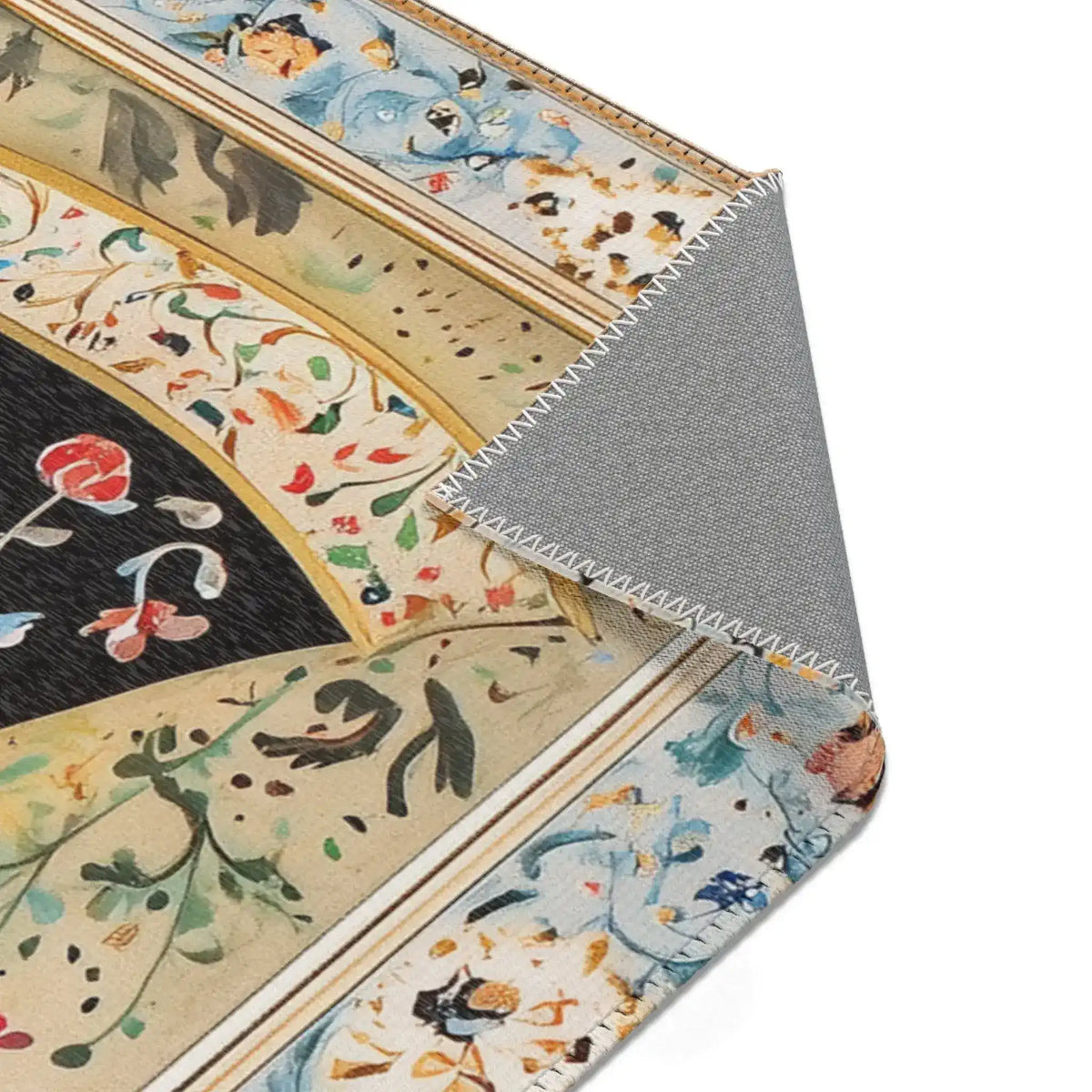Persian Beauty Hand-Painted Floral Art Rug corner fold detail with red rose on cream field, blue outer border folded, grey backing