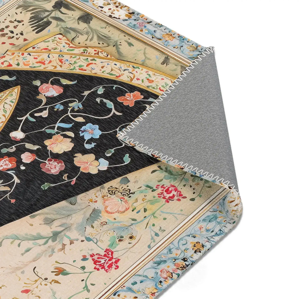 Persian Beauty Hand-Painted Floral Art Rug corner fold showing floral black robe detail, cream border, gold line, grey backing