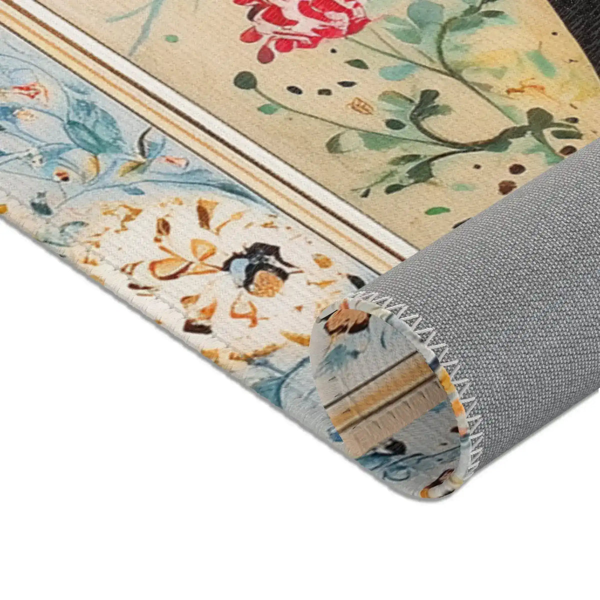 Persian Beauty Hand-Painted Floral Art Rug rolled corner showing blue floral border, cream center with red rose, grey non-slip backing