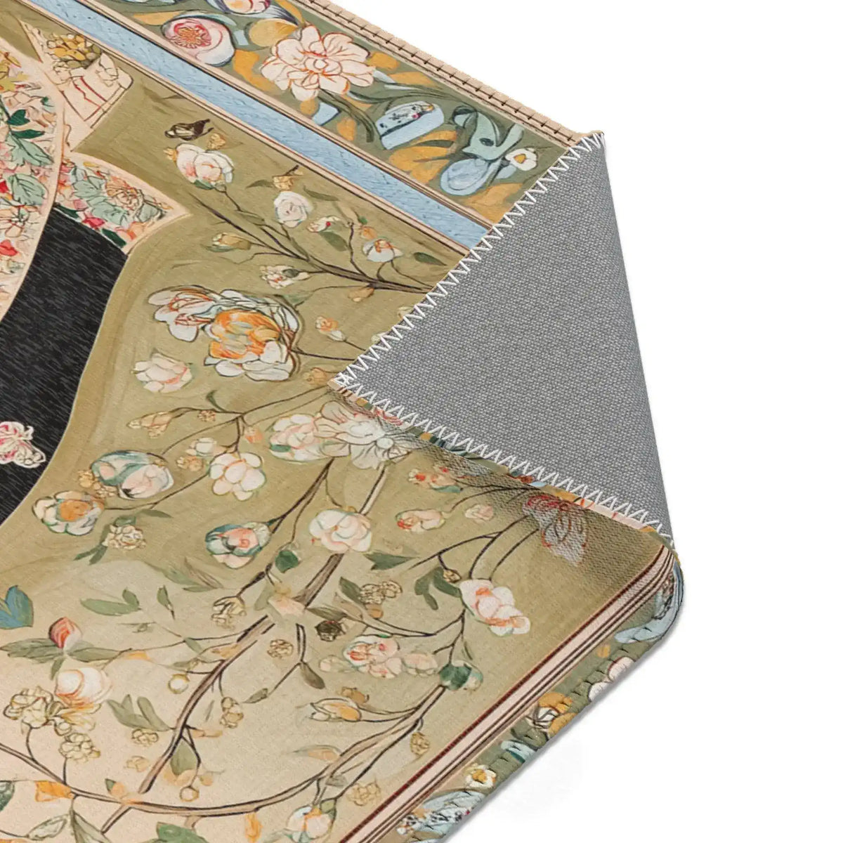 Persian Elegance Floral Black Robe Art Rugs folded corner detail showing dark baroque pattern with red and gold accents on grey backing