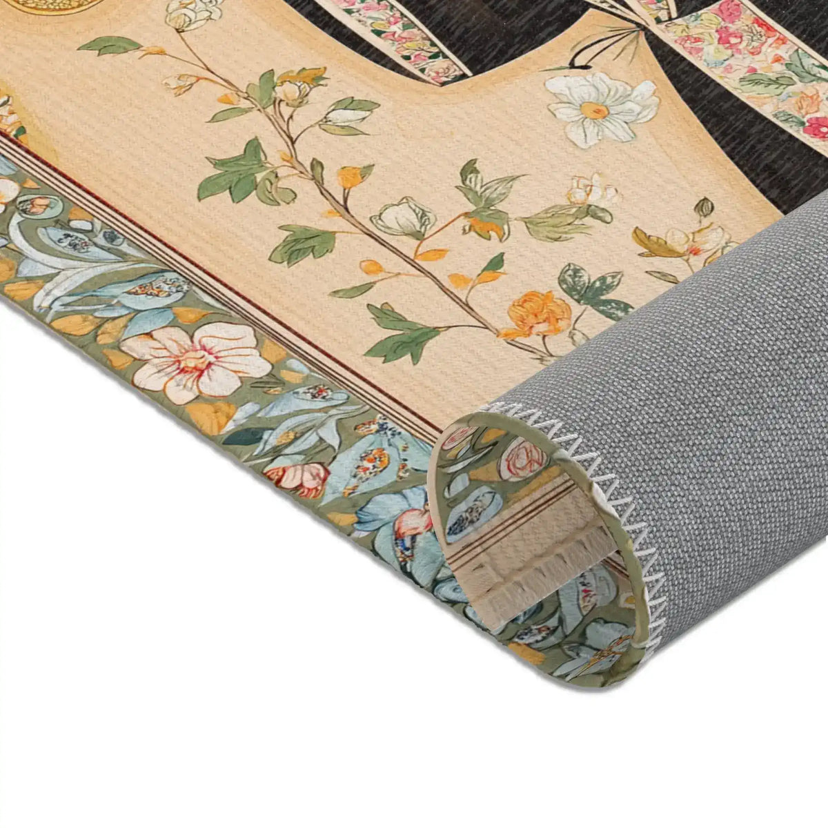 Persian Elegance Floral Black Robe Art Rugs corner rolled showing grey backing and cream botanical border with delicate flower detail