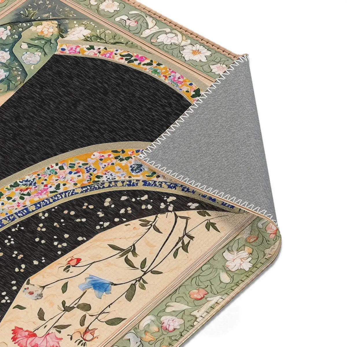 Folded corner of the Persian Hand-Painted Floral Calligraphy Rug exposing grey backing, cream body with dark swirling robe design visible