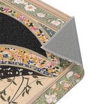Corner fold of the Persian Hand-Painted Floral Calligraphy Rug revealing grey non-slip back, floral calligraphy border edge in sage green