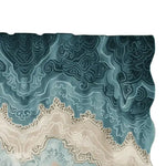 Close-up view of a Persian Heritage Hand Tufted Wool Rug showcasing its intricate abstract patterns in shades of blue and beige. This contemporary area rug is perfect for adding elegance to living room spaces.