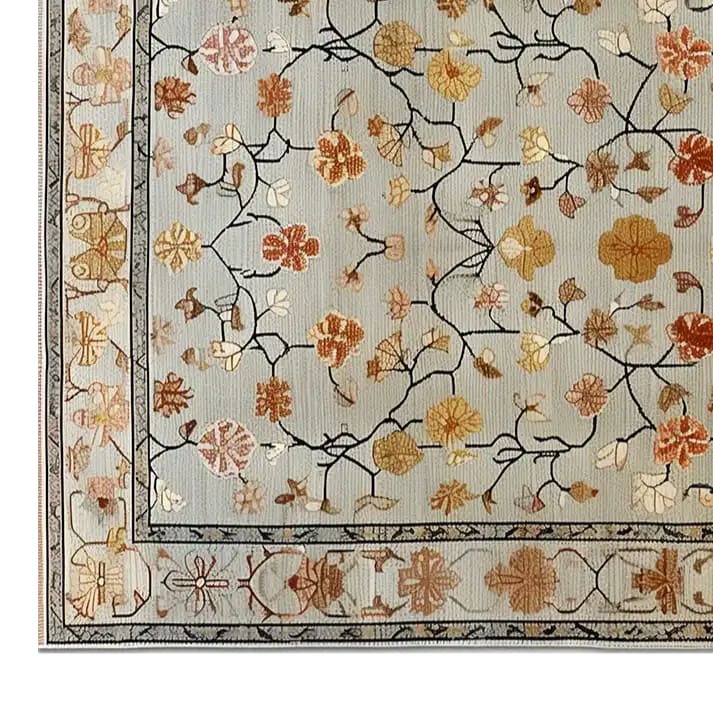A beautifully designed Persian Petals Hand Tufted Wool Rug showcasing an intricate floral pattern in warm tones. This living room area rug is crafted from high-quality wool, making it a perfect floral rug choice for those seeking stylish and durable rugs for the living room.