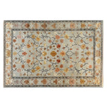 A beautiful Persian Petals Hand Tufted Wool Rug featuring a detailed floral design in soft, earthy tones. This area rug is perfect for enhancing the elegance of any living room. The intricate pattern of this wool rug showcases a blend of traditional and contemporary styles, making it an ideal choice for those looking for sophisticated rugs for living rooms.