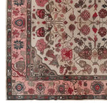 Top view of a Persian Reflection hand-tufted wool rug, showcasing intricate floral and geometric patterns in shades of red, pink, and beige. This elegant area rug is perfect for an 8x10 living room space, adding a touch of classic charm to your home decor.