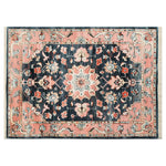 Top view of a Persian Serenade Hand Tufted Wool Rug, showcasing an intricate floral pattern with pink and dark blue hues. This elegant area rug is perfect for adding a touch of style to living rooms, embodying the charm of traditional Persian rugs.