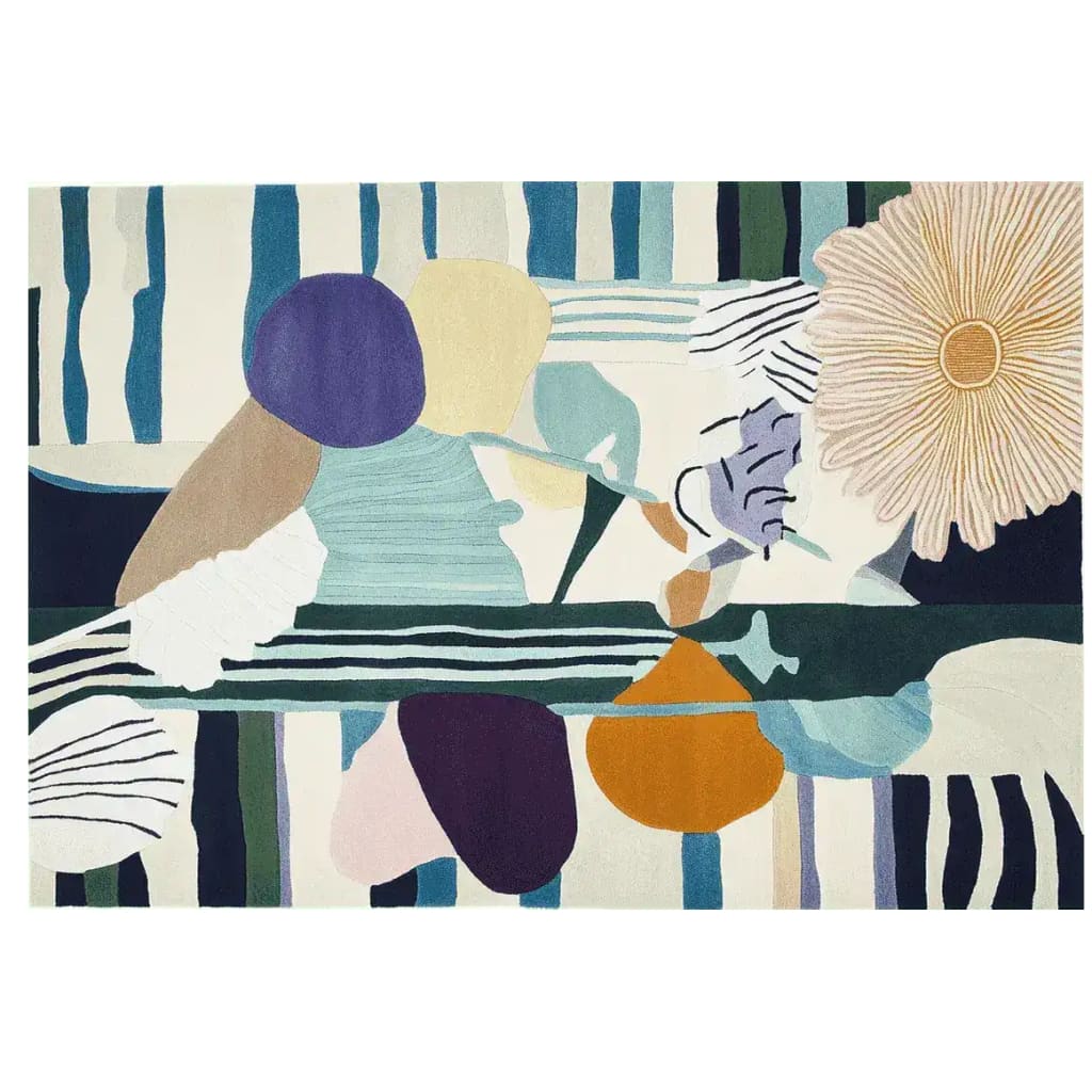 Top view of Petal Chaos Hand Tufted Area Rug showcasing a vibrant abstract design with bold floral patterns in multiple colors, perfect for contemporary living room decor. This wool rug adds a touch of modern style to any space, ideal for those seeking stylish rugs for living room.