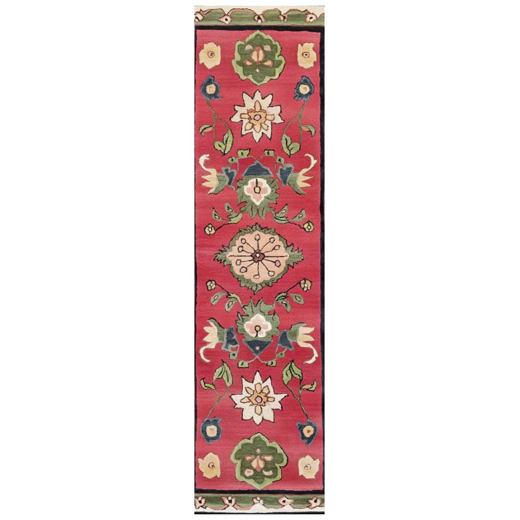 Top view of the Petal Harmony Hand Tufted Wool Rug, a vibrant runner rug featuring intricate floral patterns in shades of red, green, and cream. Ideal for adding a splash of color to kitchen spaces, hallways, or bathrooms, this wool rug offers both durability and style.