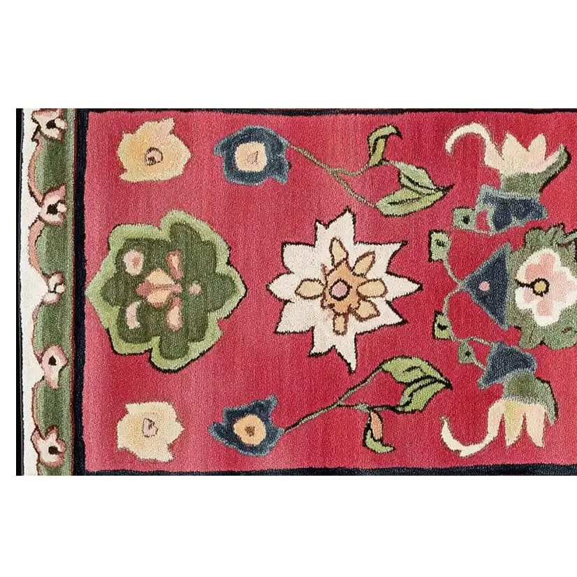 Close-up view of the Petal Harmony Hand Tufted Wool Rug, showcasing a vibrant floral design with rich red, green, and white hues, perfect for adding a touch of elegance to your kitchen rugs collection, hallway runner rug, or bathroom runner rug.