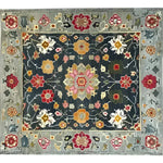 A stunning Petal Illusion Hand Knotted Area Rug featuring intricate floral patterns in vibrant colors. Perfect for adding a touch of elegance to any living room, this 8x10 vintage Persian rug showcases a beautiful blend of traditional and contemporary design elements.