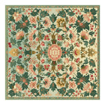 A beautifully intricate Petal Medallion Echo Hand Tufted Rug, showcasing a floral design with vibrant colors. This square area rug is perfect for large living rooms, adding elegance and style to your space. Made from high-quality wool, this floral rug is a stunning example of rugs for living rooms, combining traditional craftsmanship with a modern aesthetic.