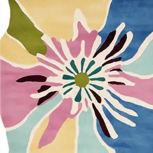 Vibrant Petal Power Pop Hand Tufted Area Rug showcasing a bold floral design in pink, blue, and green hues. Perfect for adding a contemporary touch to living room spaces, this wool rug combines style and comfort, making it an ideal choice for area rugs for living rooms.
