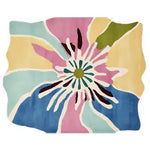 This vibrant area rug features a bold and colorful abstract floral design, perfect for adding a contemporary touch to any living room. The Petal Power Pop Hand Tufted Rug is crafted from high-quality wool, making it a durable and stylish choice for those seeking unique living room area rugs.