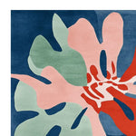 Vibrant Petal Pulse Pop Hand Tufted Area Rug in a contemporary abstract design, featuring bold pink, green, blue, and red colors. This square wool rug is perfect for adding a modern touch to living room spaces, especially in an 8x10 size.