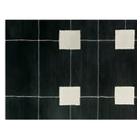 A contemporary hand tufted wool runner rug featuring a geometric pattern with white squares on a dark background. Ideal for use as a hallway runner rug, kitchen rug, or bathroom runner rug, this elegant and modern wool rug adds a touch of sophistication to any space.
