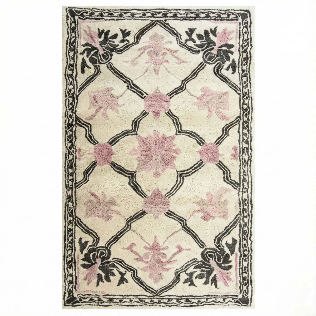 Elegant Petal Veil Mosaic Hand Tufted Area Rug, perfect for adding a vintage touch to your living room or dining room. The design features delicate pink floral patterns with intricate black detailing on a cream background, ideal for living room rugs 8x10 or as a wool rug centerpiece.