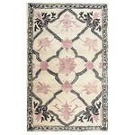 Elegant Petal Veil Mosaic Hand Tufted Area Rug, perfect for adding a vintage touch to your living room or dining room. The design features delicate pink floral patterns with intricate black detailing on a cream background, ideal for living room rugs 8x10 or as a wool rug centerpiece.
