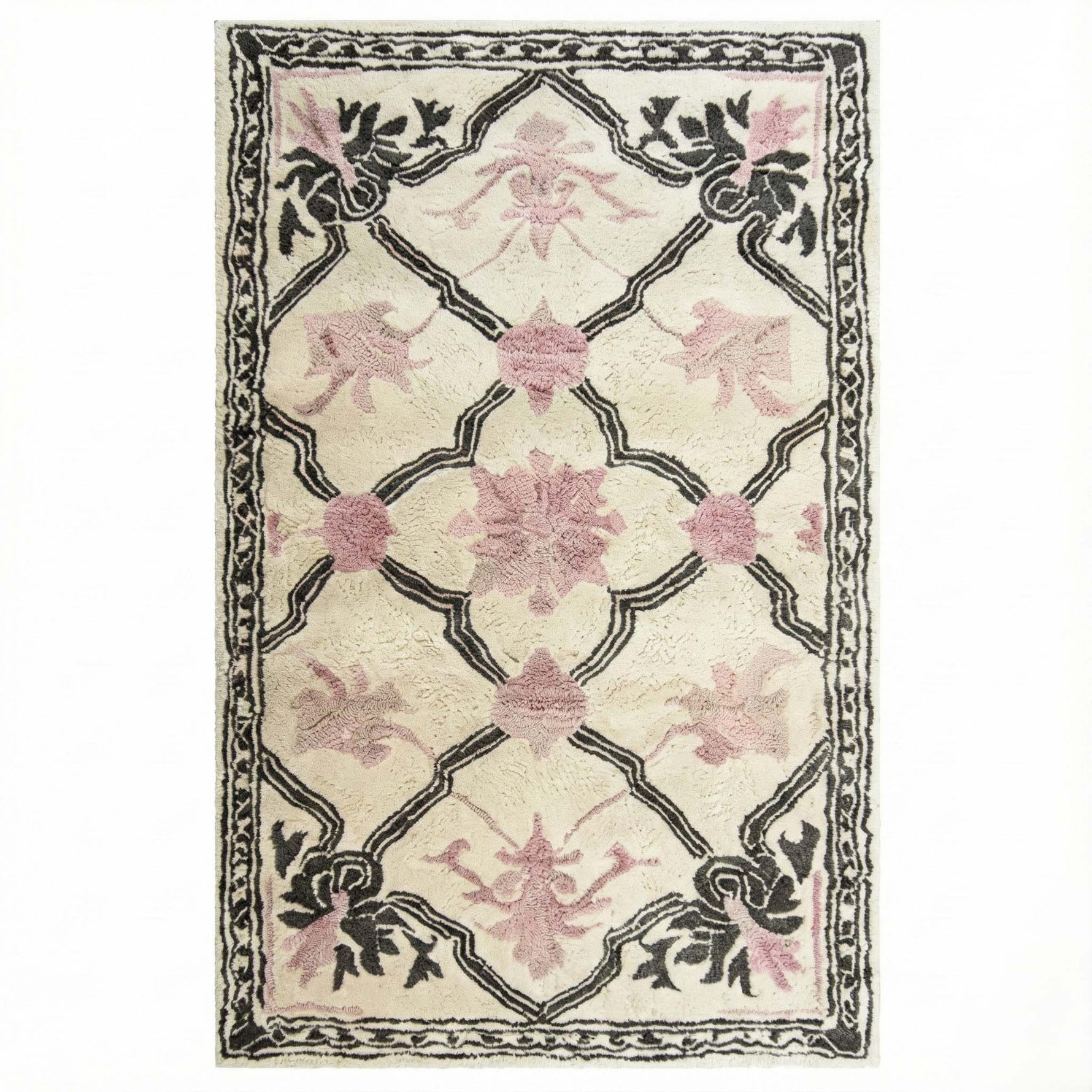 Elegant Petal Veil Mosaic Hand Tufted Area Rug, perfect for adding a vintage touch to your living room or dining room. The design features delicate pink floral patterns with intricate black detailing on a cream background, ideal for living room rugs 8x10 or as a wool rug centerpiece.