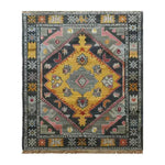 A beautifully crafted Petals in Motion hand-knotted area rug featuring a vibrant geometric design. This vintage rug showcases rich hues of yellow, gray, and red, reminiscent of traditional Persian rugs. Perfect for adding a touch of elegance to living room area rugs.