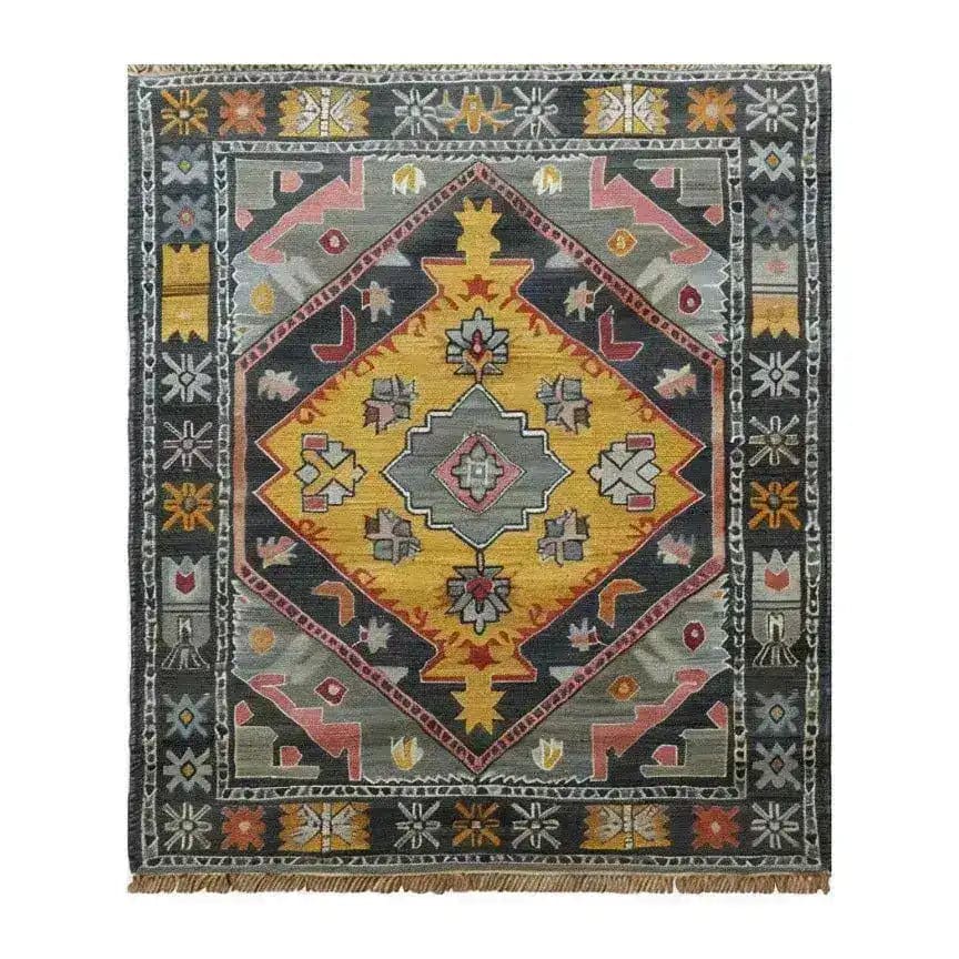 A beautifully crafted Petals in Motion hand-knotted area rug featuring a vibrant geometric design. This vintage rug showcases rich hues of yellow, gray, and red, reminiscent of traditional Persian rugs. Perfect for adding a touch of elegance to living room area rugs.