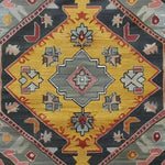 This vibrant hand-knotted area rug, titled 'Petals in Motion', showcases a stunning geometric design with bold colors, perfect for adding a vintage touch to any living room. Reminiscent of Persian rugs, its intricate patterns and rich hues make it a standout piece.