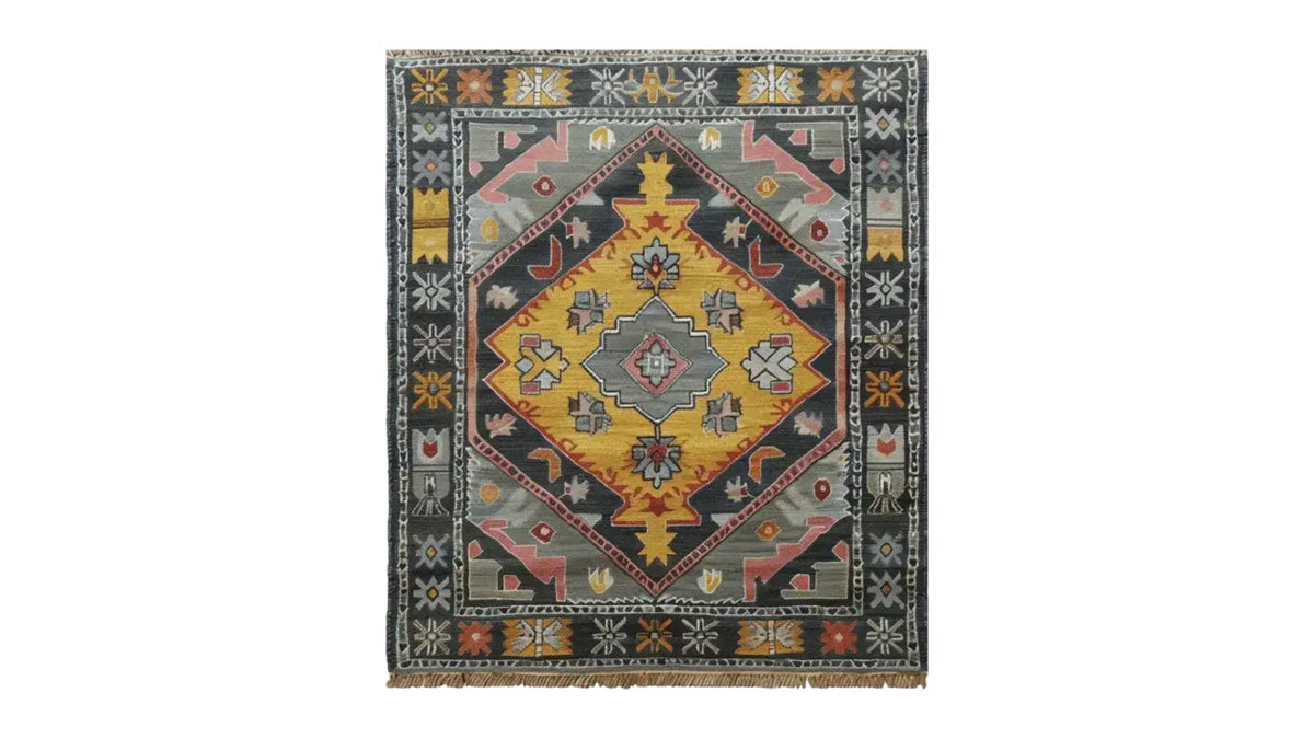 Beautifully crafted hand-knotted area rug featuring a vibrant geometric design with rich colors, reminiscent of vintage Persian rugs. Perfect for adding a touch of elegance to any living room.