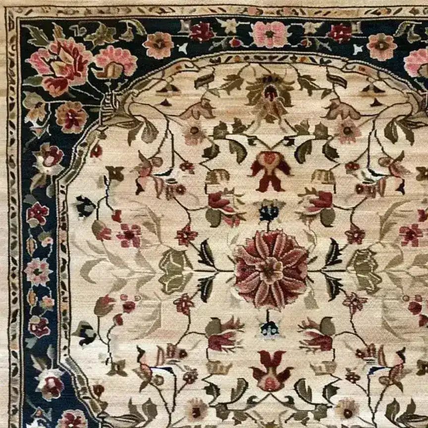 This beautiful hand-knotted area rug features an intricate floral design, perfect for adding elegance to your dining room or bedroom. The square area rug showcases a blend of vibrant colors with classic Persian rug motifs, crafted from high-quality wool. Ideal as a dining table rug or to enhance any space with its timeless charm.